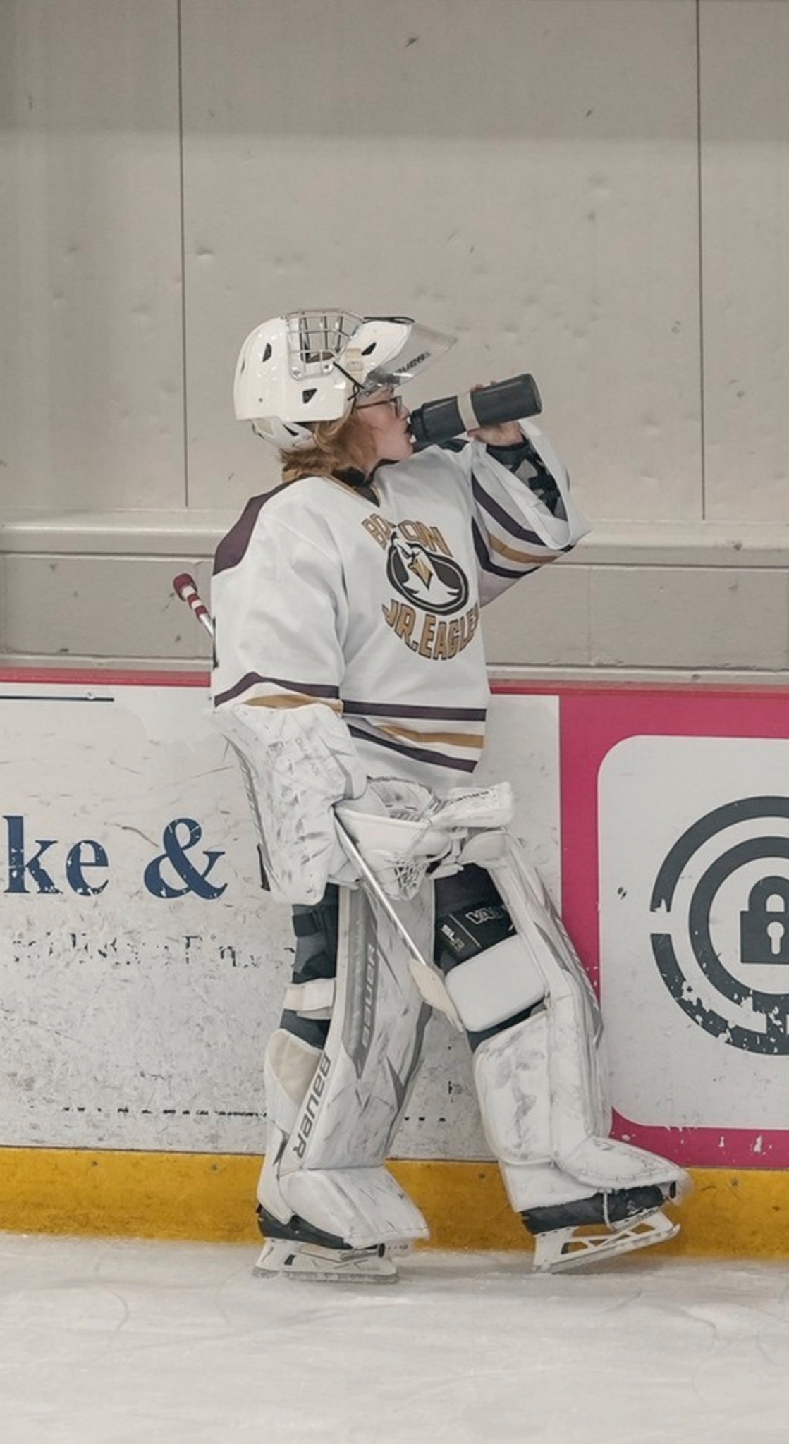 Grace Gordon rinkside in goalie equipment